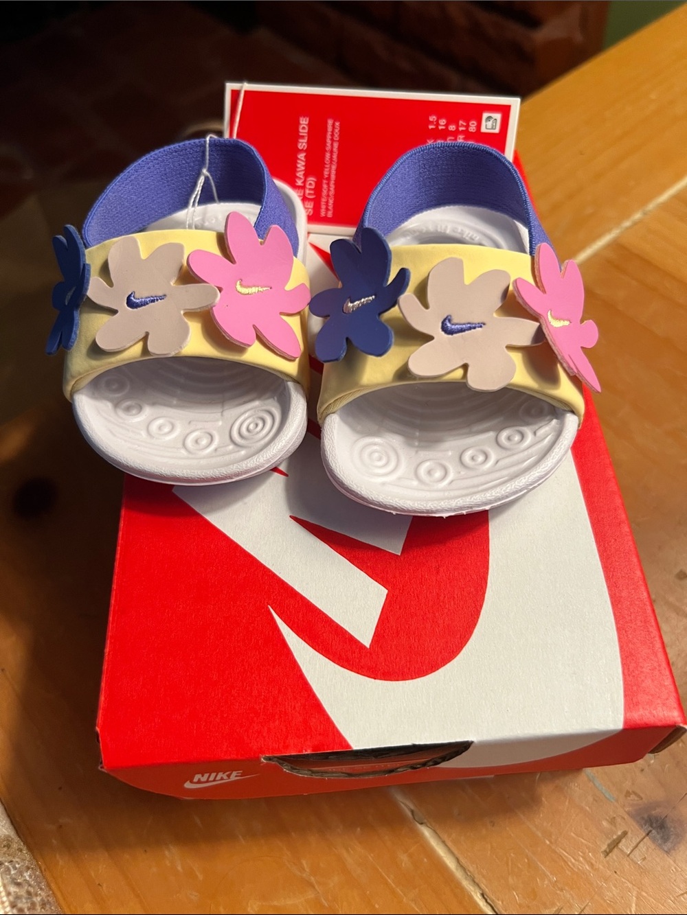 Nike Infant Kawa White Slides with Pink & Purple Floral Accents